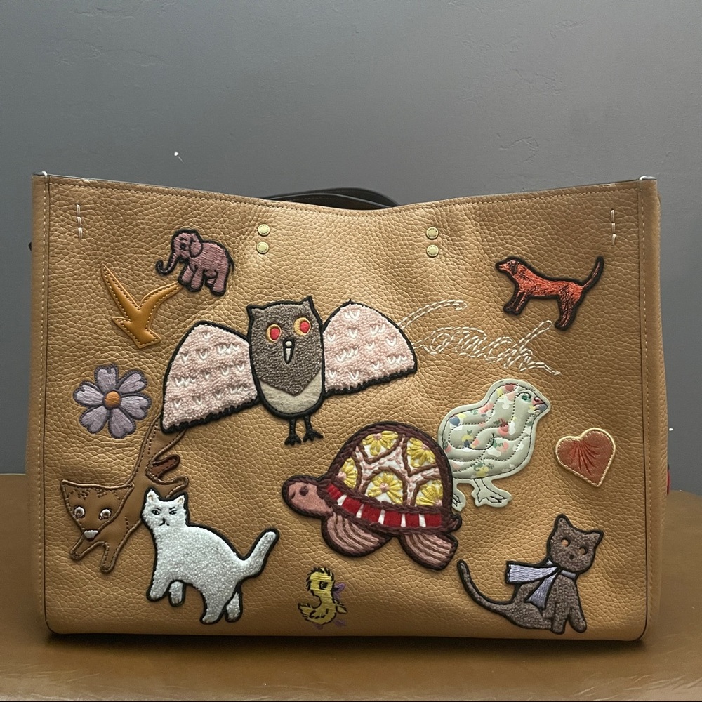 Coach Rogue 39 with Creature patches
